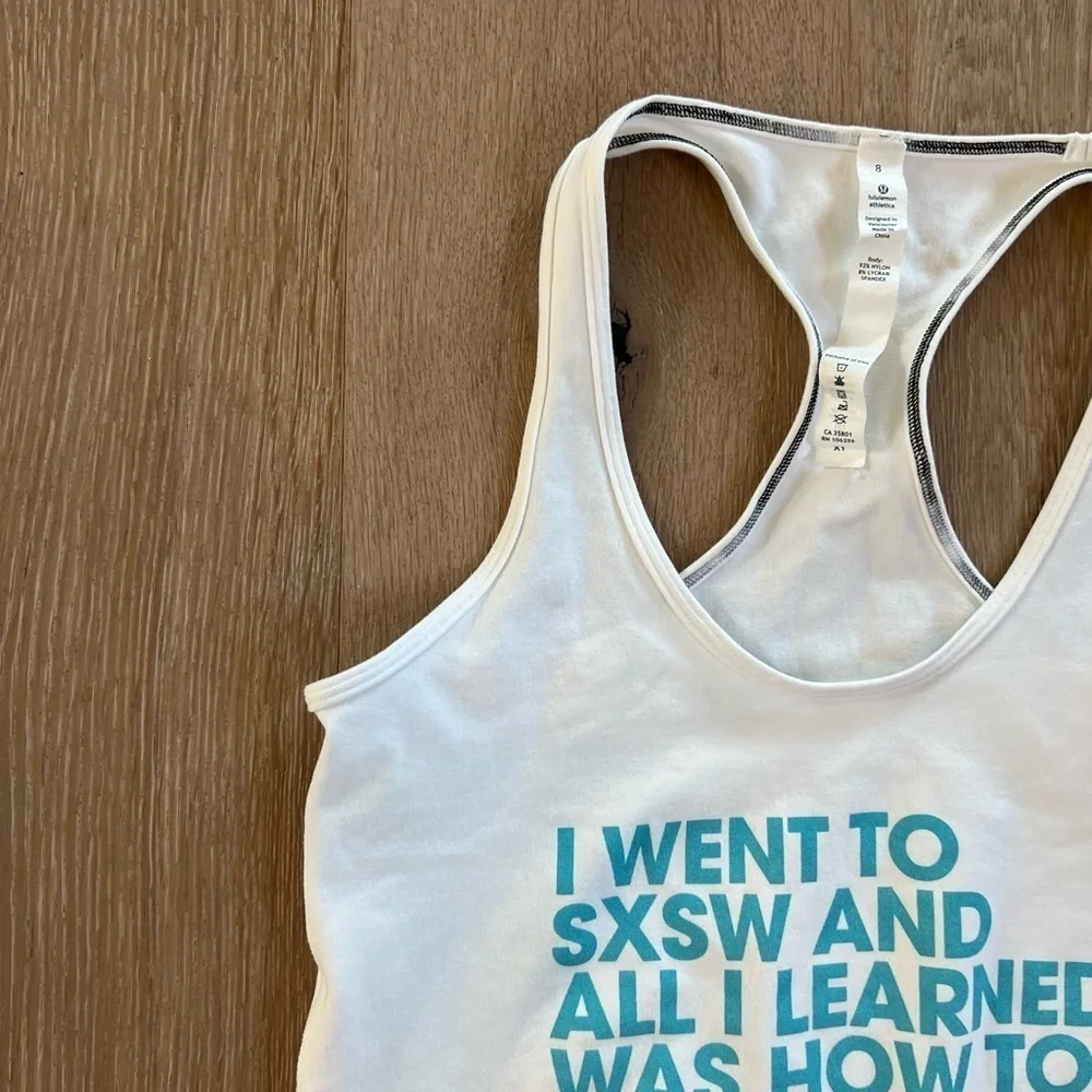 Lululemon White Racer Back Tank Top with Blue Text SXSW Austin
